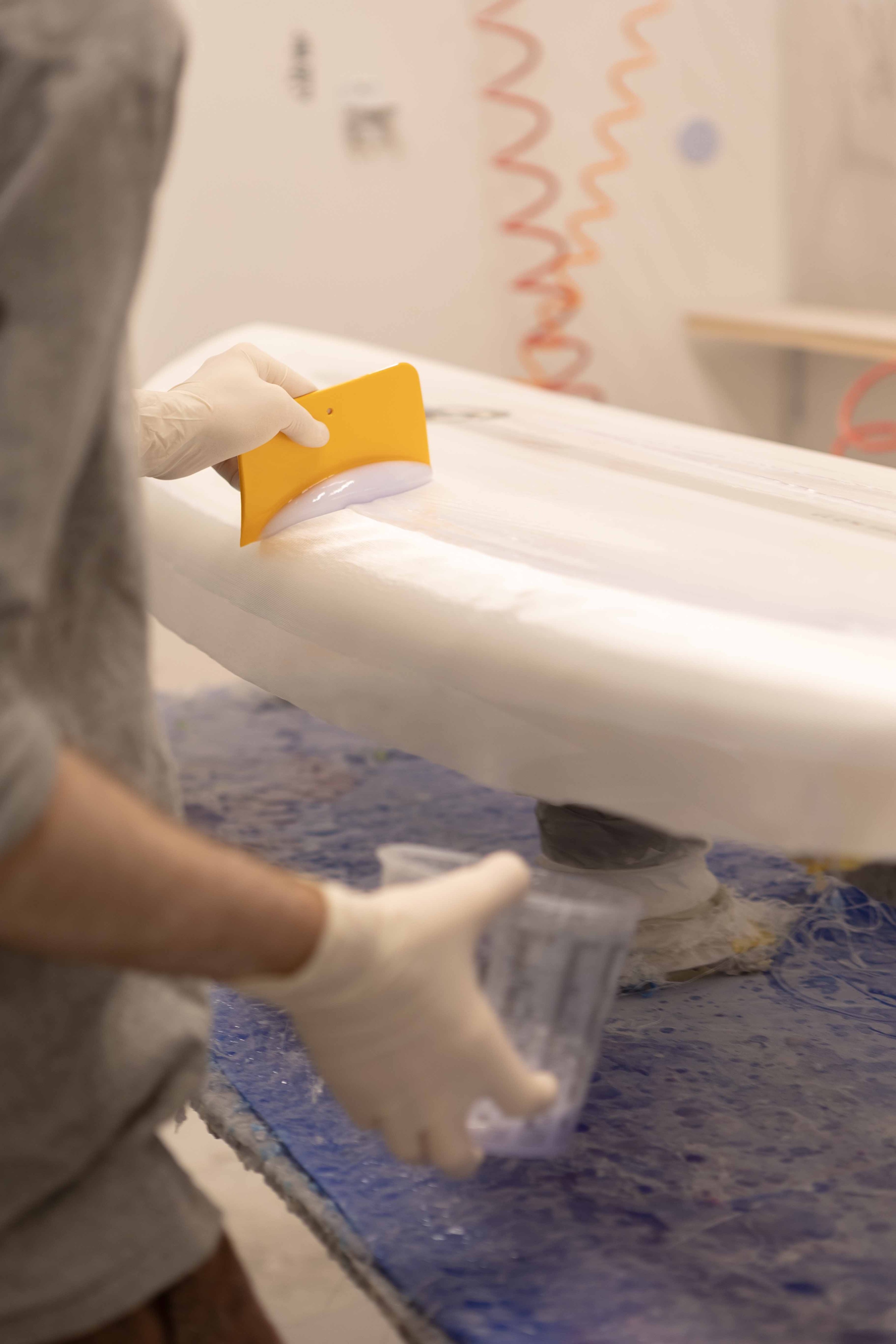 Surfboard lamination process