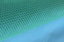 Close-up swatch of the Greenflow 75 mesh bonded to Wrightlon 3700 P16 release film