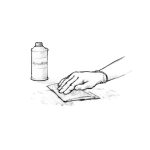 Wiping a surface with solvent on a paper towel to remove contaminants.